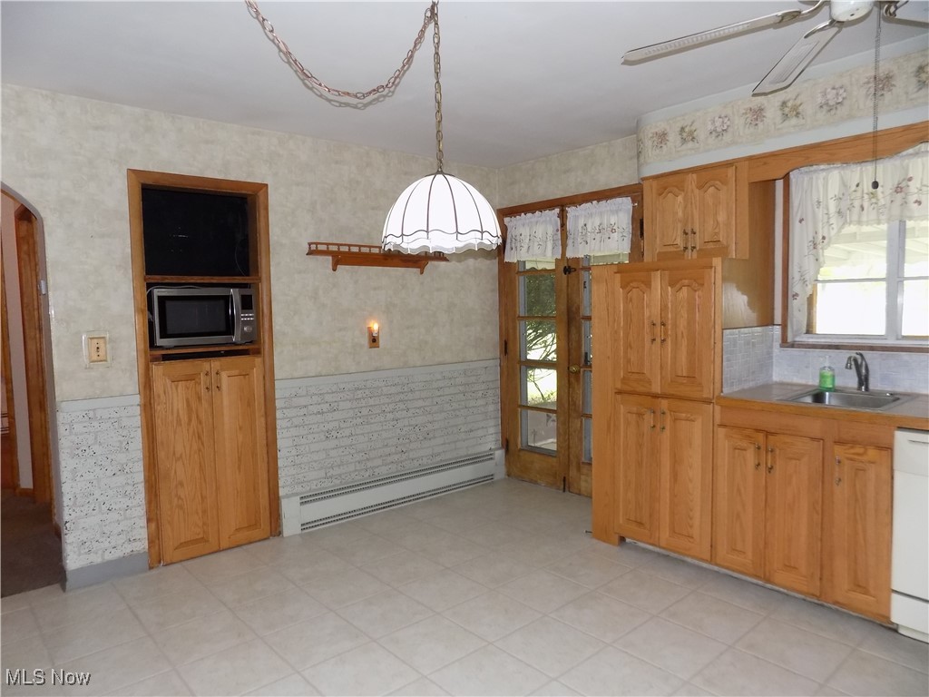 2380 West Pleasant Valley Road Parma, OH 44134 - Photo 4 of 38 Spacious kitchen with ceiling fan, ample cabinets and storage.