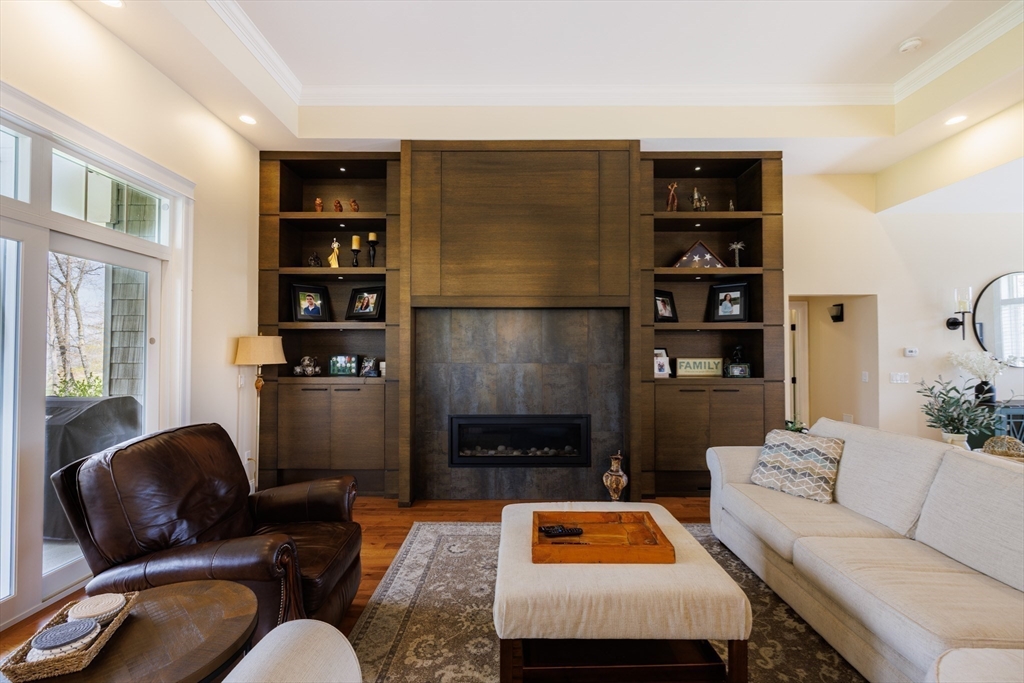 1776 Old Turnpike Road Oakham, MA 01068 - Photo 13 of 42 a living room with furniture and a fireplace