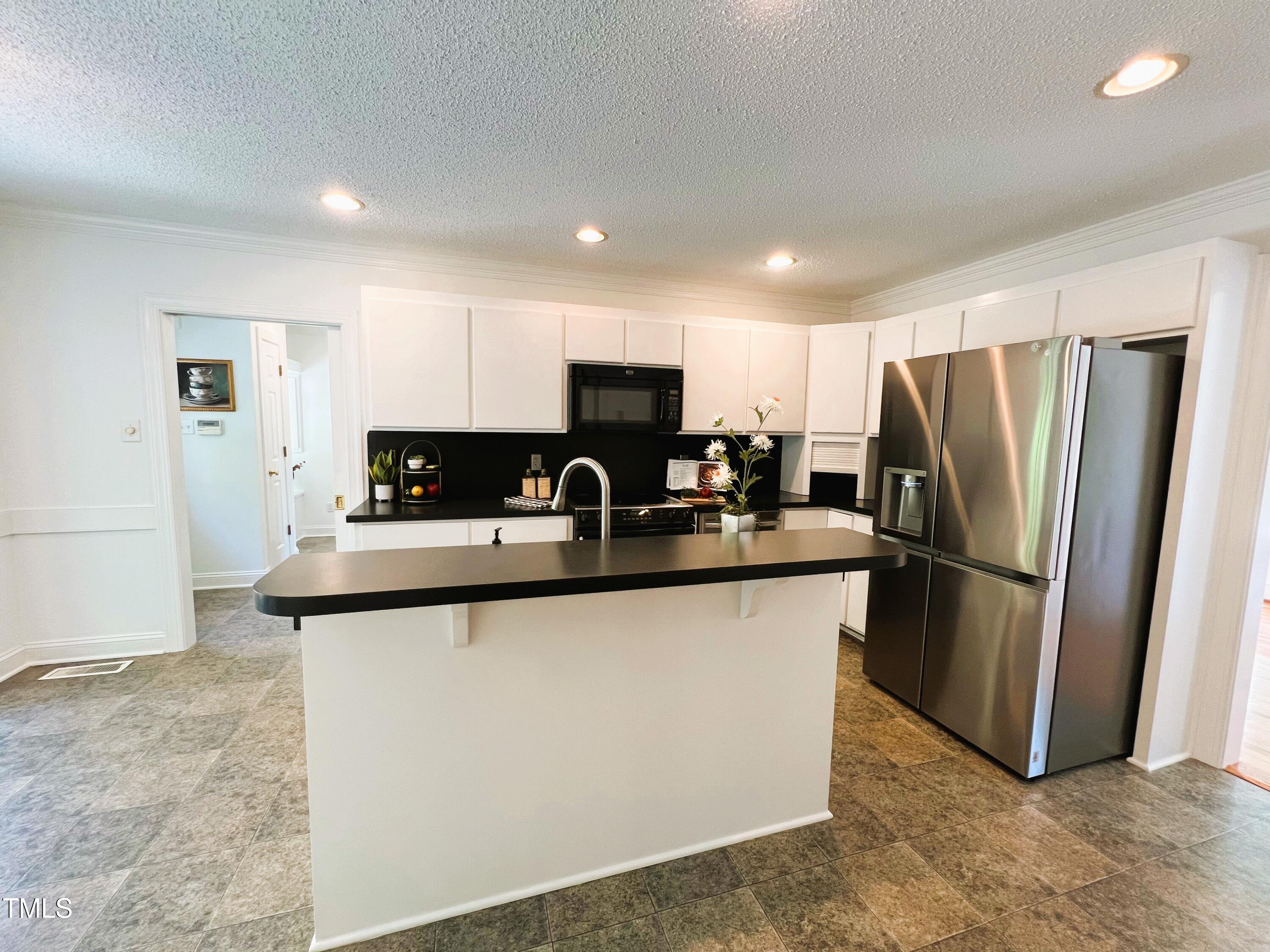 1846 Forest Wood Road Rocky Mount, NC 27804 - Photo 33 of 68 Kitchen breakfast bar