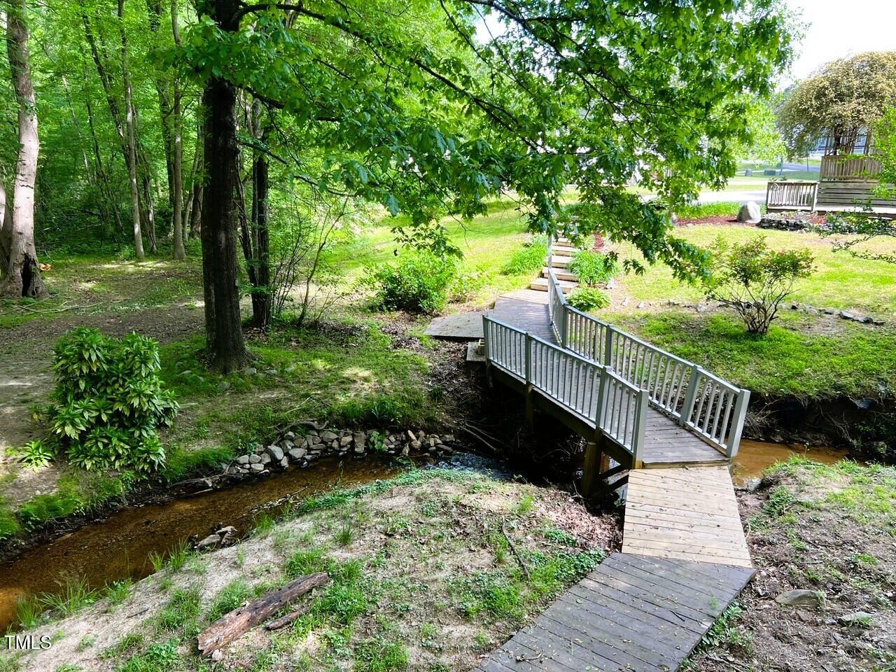 1846 Forest Wood Road Rocky Mount, NC 27804 - Photo 8 of 68 backyard bridge walkway