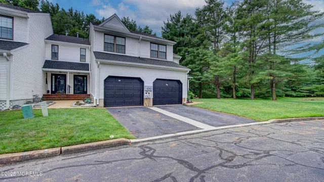 a view of a yard in front of a house
