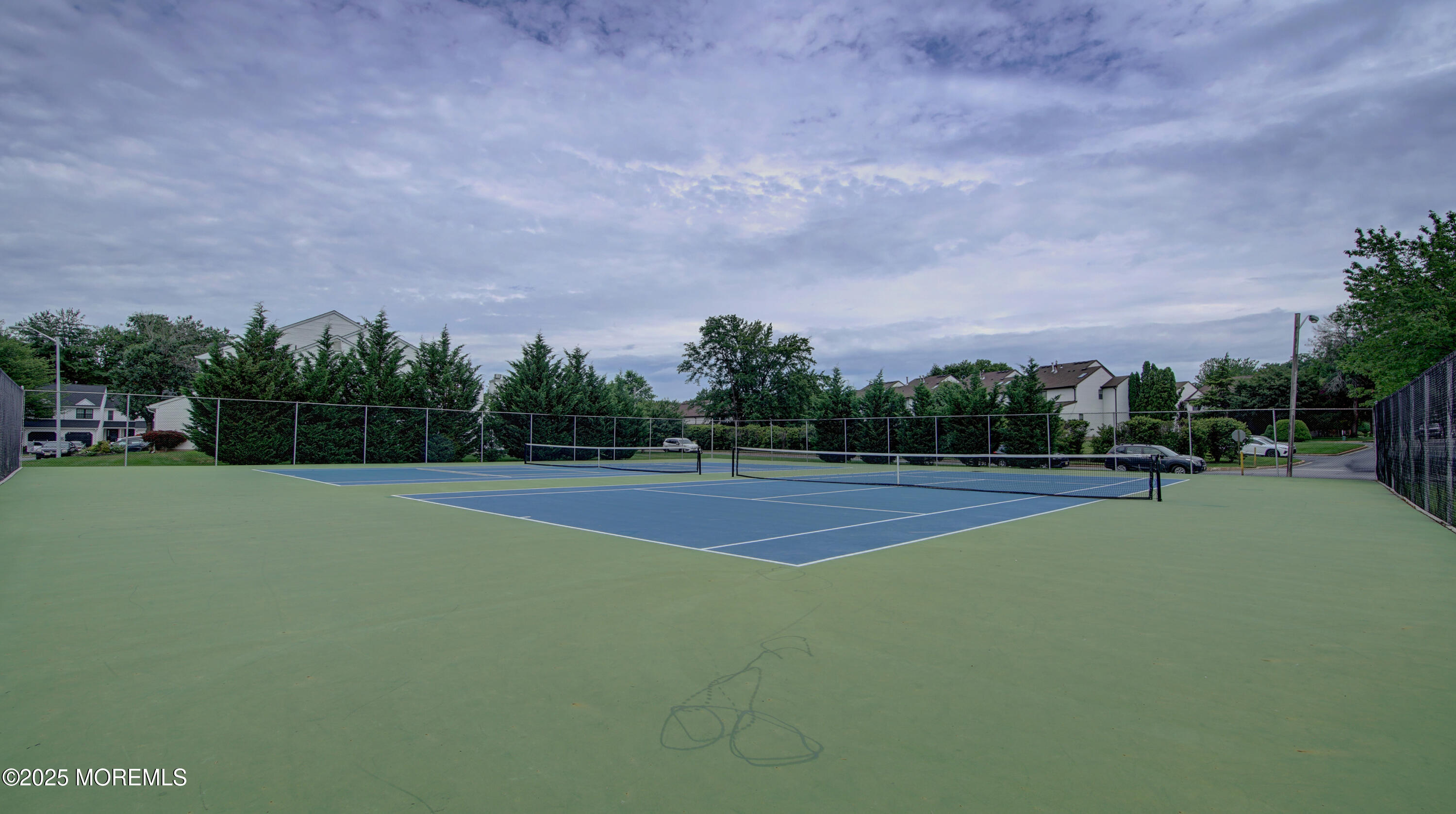 57 Chestnut Way Manalapan, NJ 07726 - Photo 22 of 23 a view of a tennis court