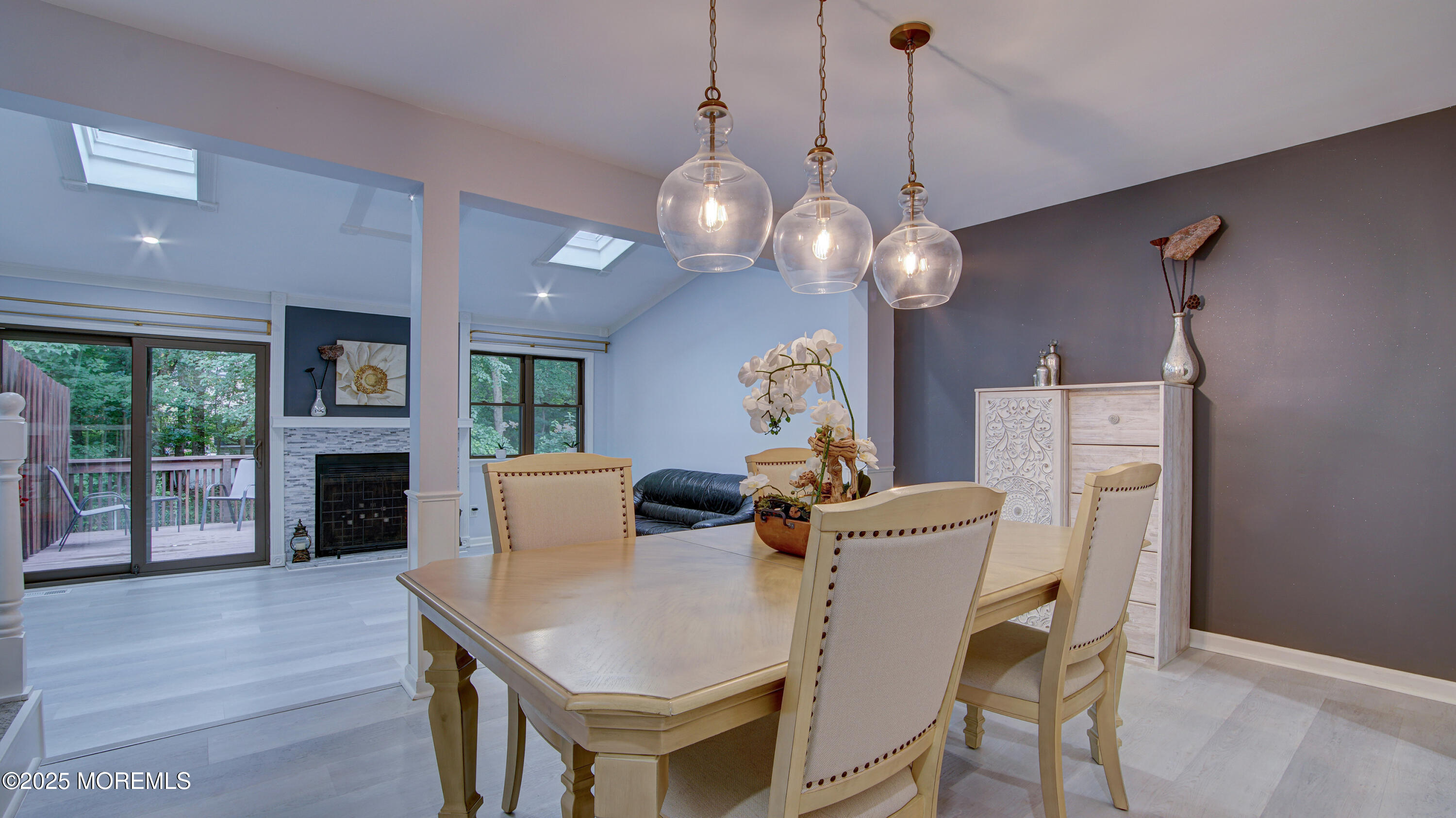 57 Chestnut Way Manalapan, NJ 07726 - Photo 3 of 23 a view of a dining room with furniture window and wooden floor