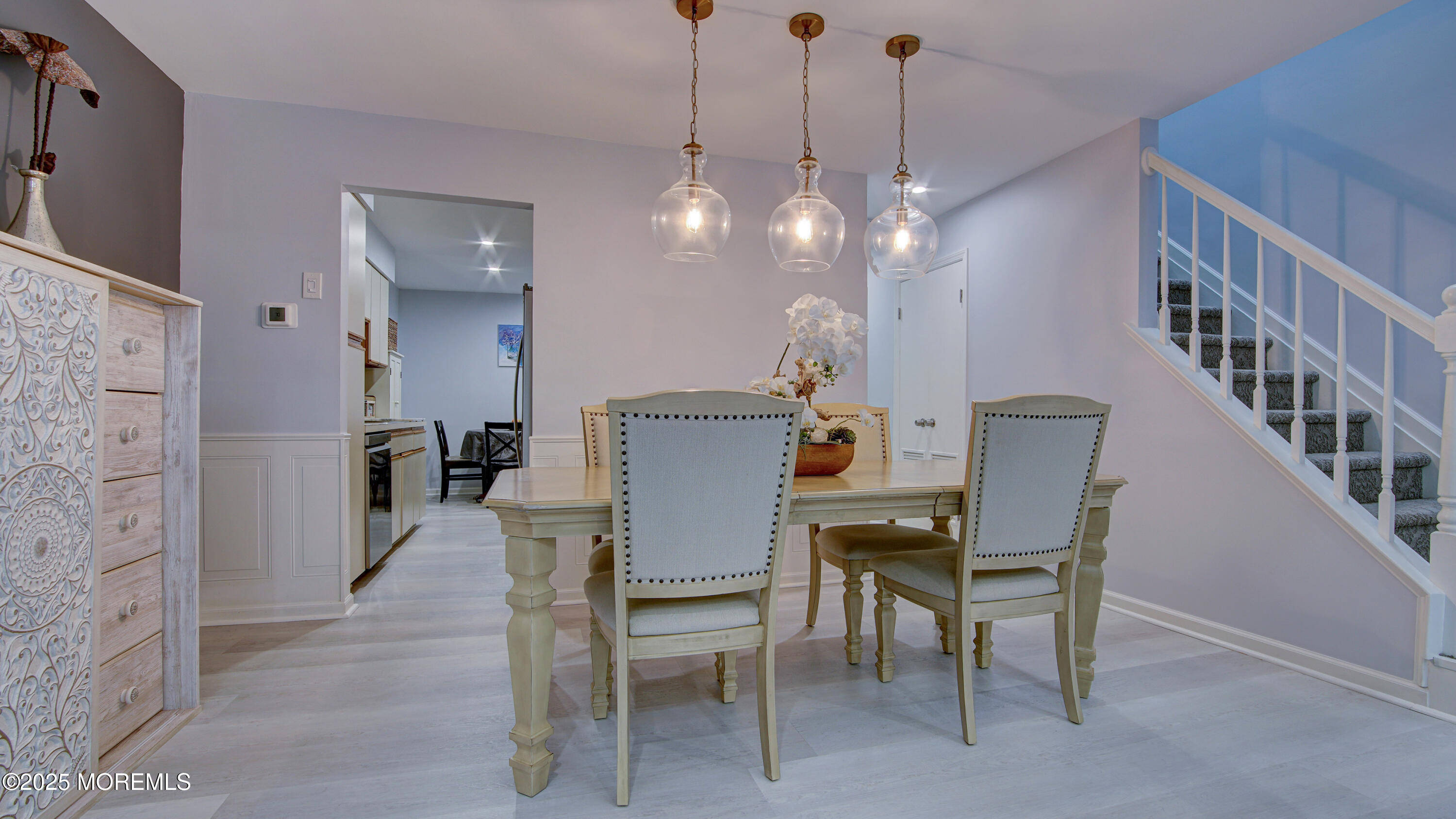 57 Chestnut Way Manalapan, NJ 07726 - Photo 4 of 23 a view of a dining room with furniture and wooden floor