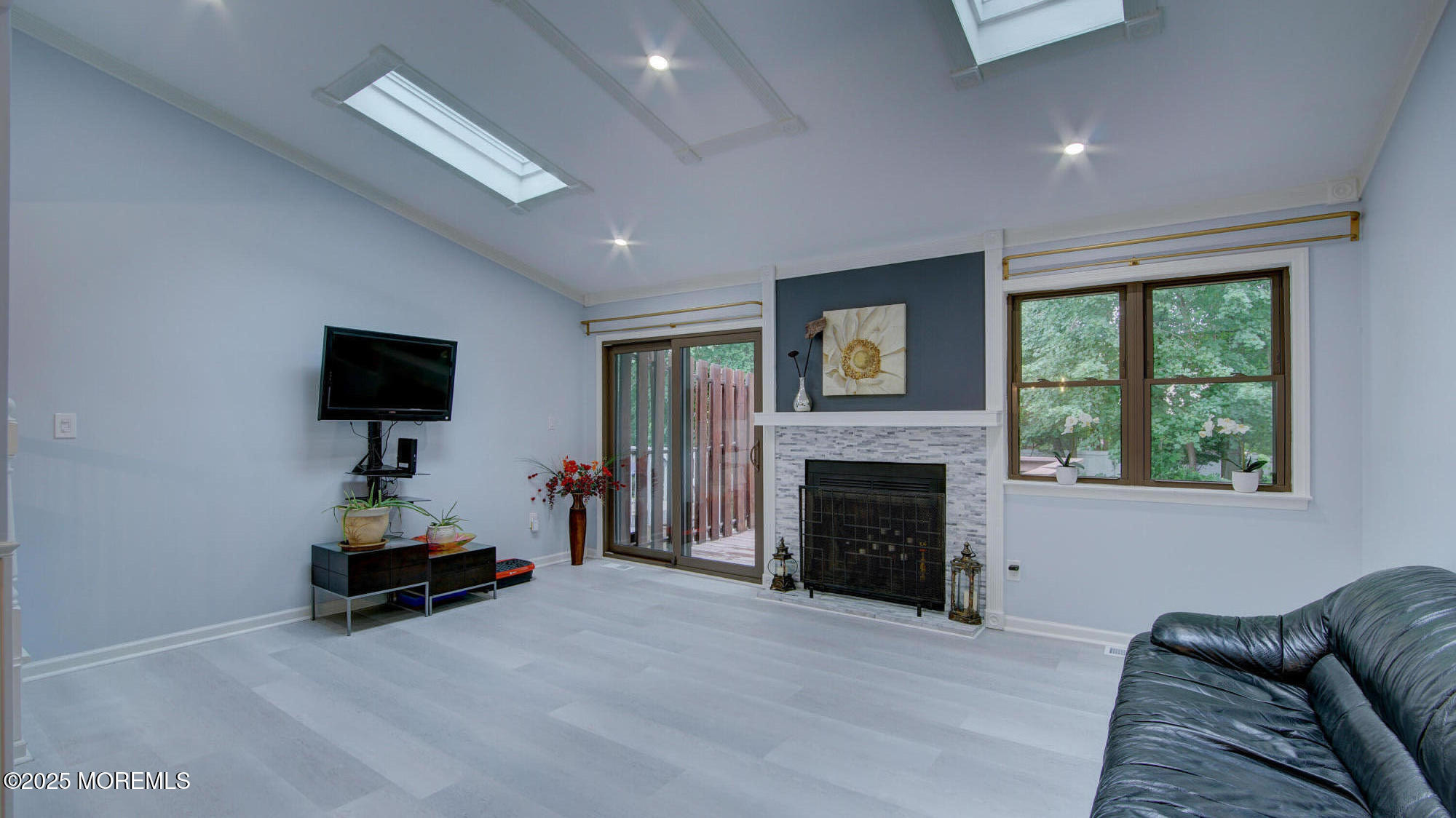 57 Chestnut Way Manalapan, NJ 07726 - Photo 6 of 23 a living room with furniture and a fireplace