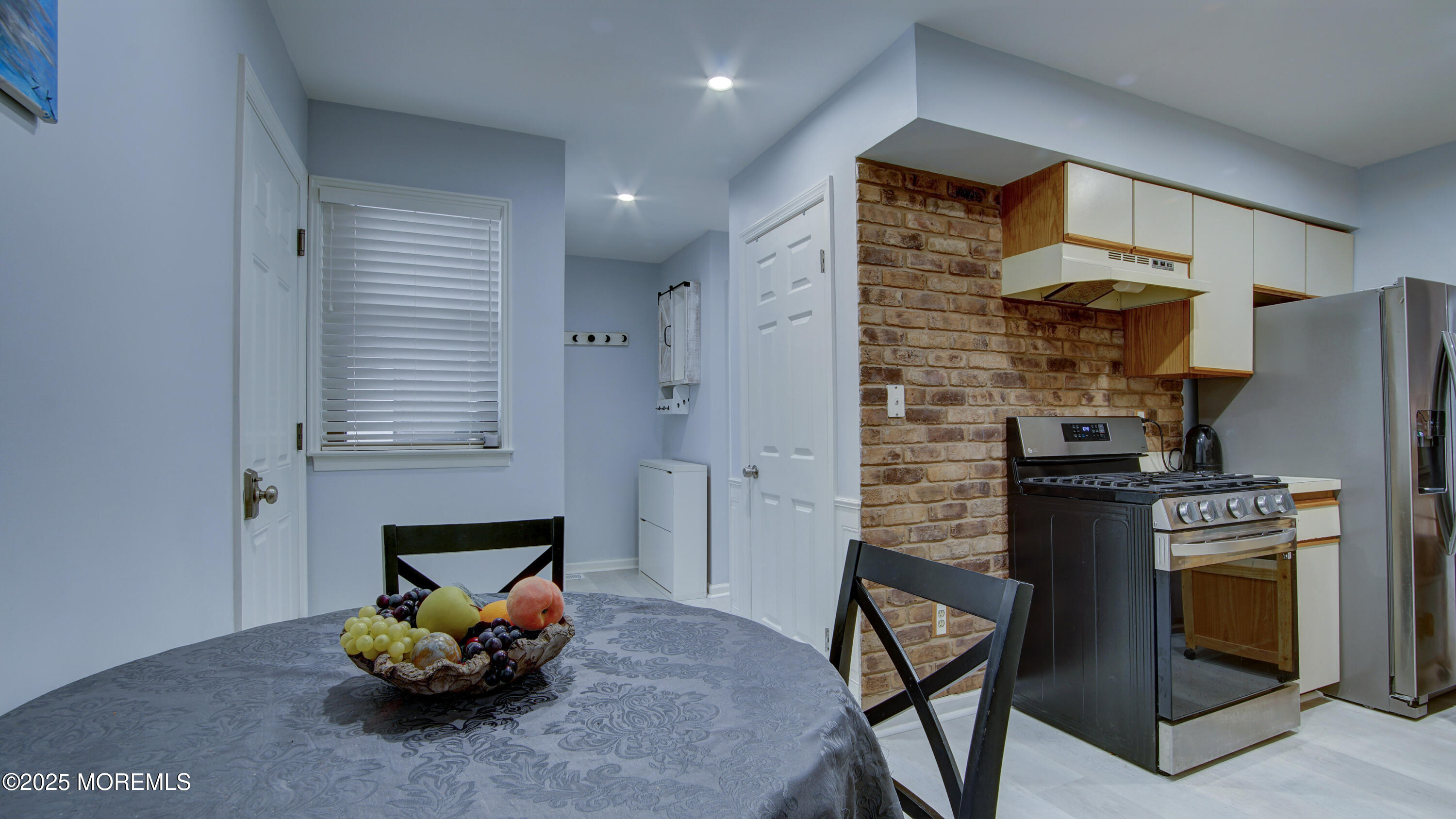 57 Chestnut Way Manalapan, NJ 07726 - Photo 10 of 23 a living room with furniture and a fireplace