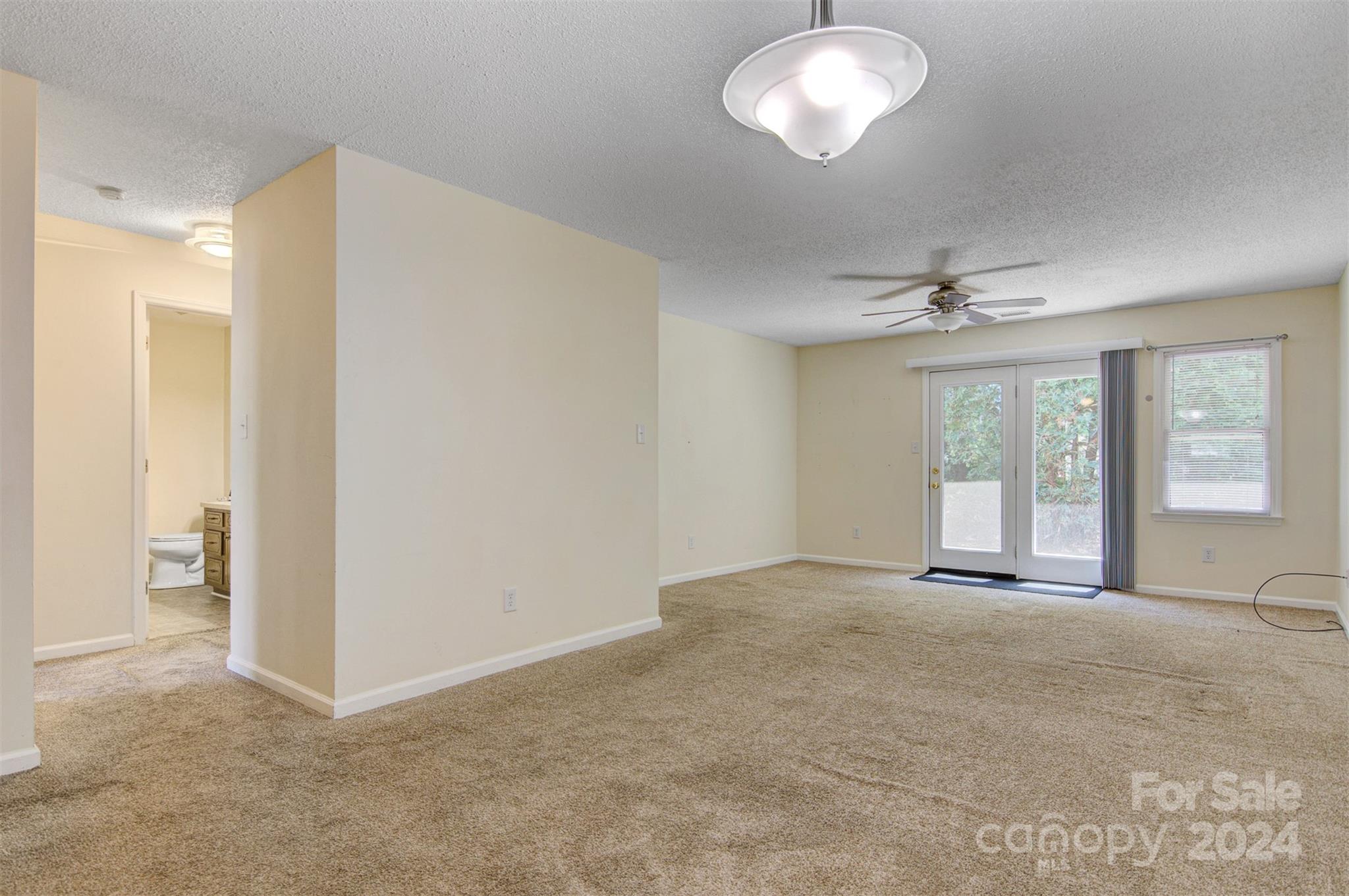 1318 5th Street Northeast Hickory, NC 28601 - Photo 5 of 27 a view of an empty room with a window