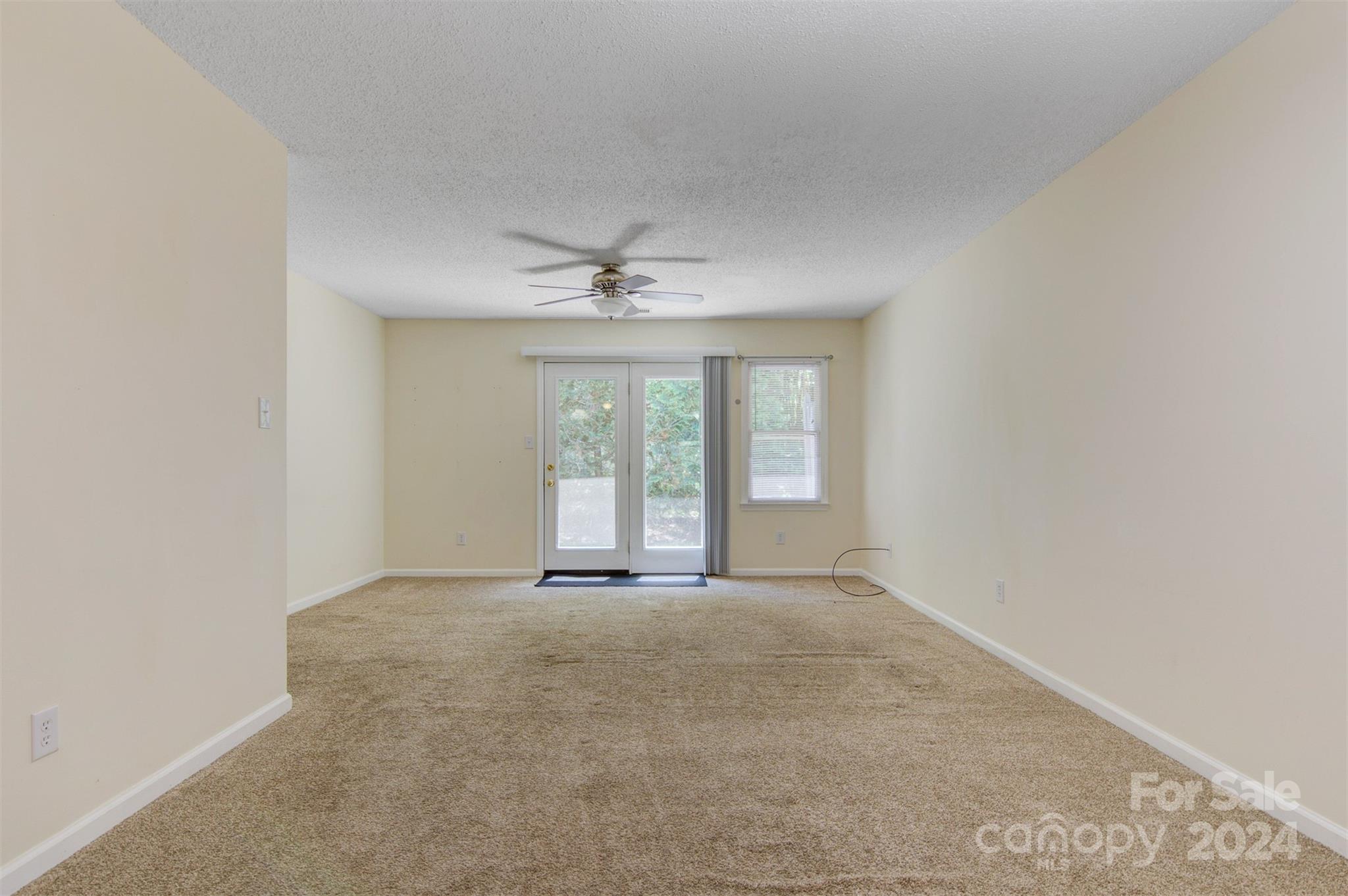 1318 5th Street Northeast Hickory, NC 28601 - Photo 6 of 27 a view of an empty room with a window
