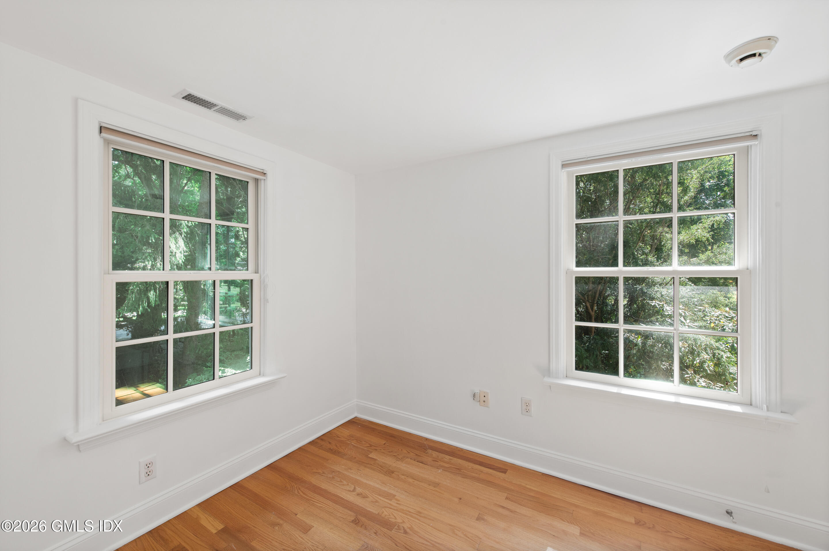 122 Round Hill Road Greenwich, CT 06831 - Photo 32 of 37 a view of an empty room with a window