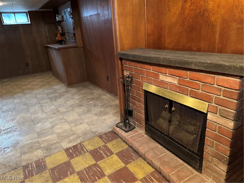 15917 Turney Road Maple Heights, OH 44137 - Photo 15 of 19 Cozy electric fireplace in lower level recreation room