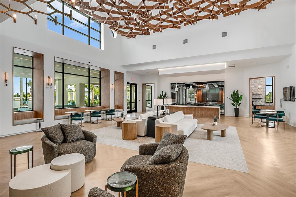 11840 Boundless Terrace Venice, FL 34293 - Photo 18 of 40 a living room with furniture and a large window