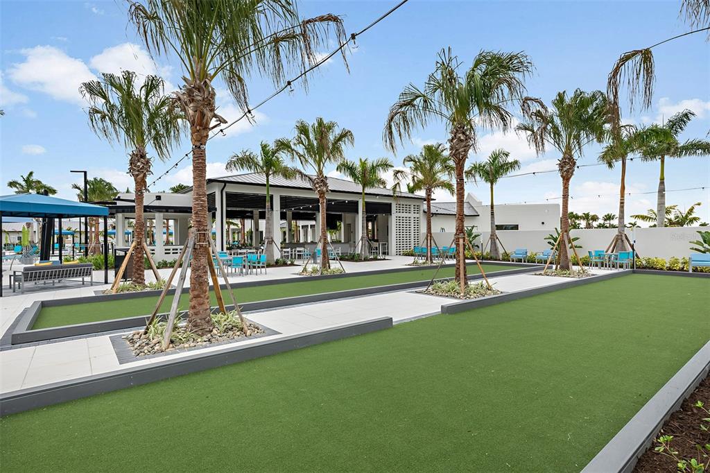 11840 Boundless Terrace Venice, FL 34293 - Photo 30 of 40 a view of a swimming pool with a garden and patio