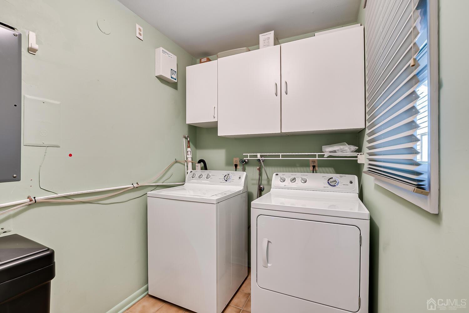96 Heather Court Edison, NJ 08820 - Photo 24 of 37 a utility room with dryer and washer