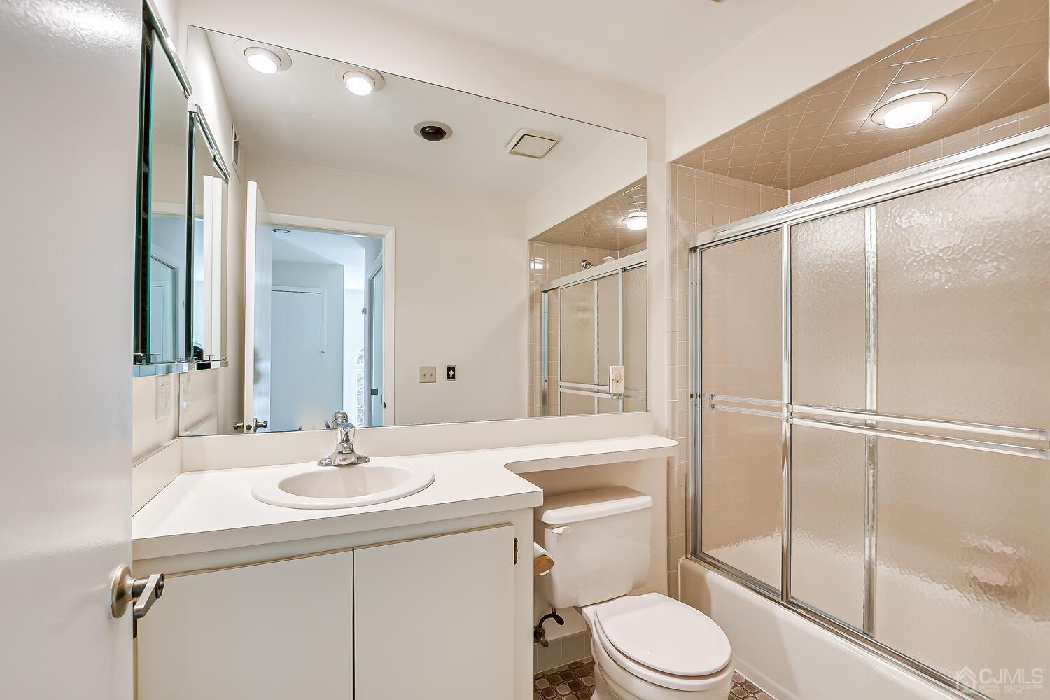 96 Heather Court Edison, NJ 08820 - Photo 34 of 37 a bathroom with a sink toilet and shower