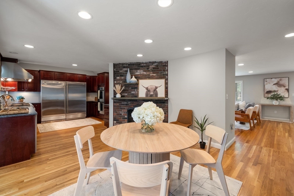 49 Walpole Street Dover, MA 02030 - Photo 7 of 40 a dining room with furniture and chandelier