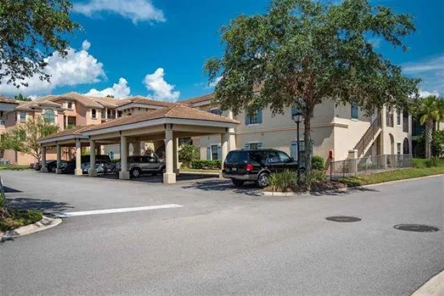 a view of a street with cars