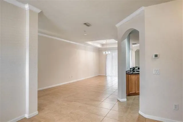 a view of a hallway with a glass door