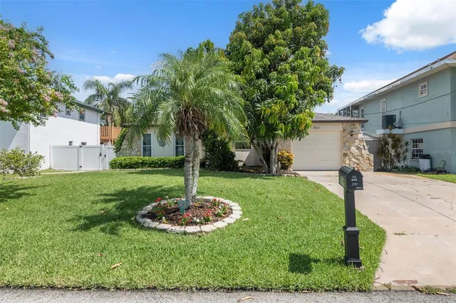 a view of a backyard with a fountain