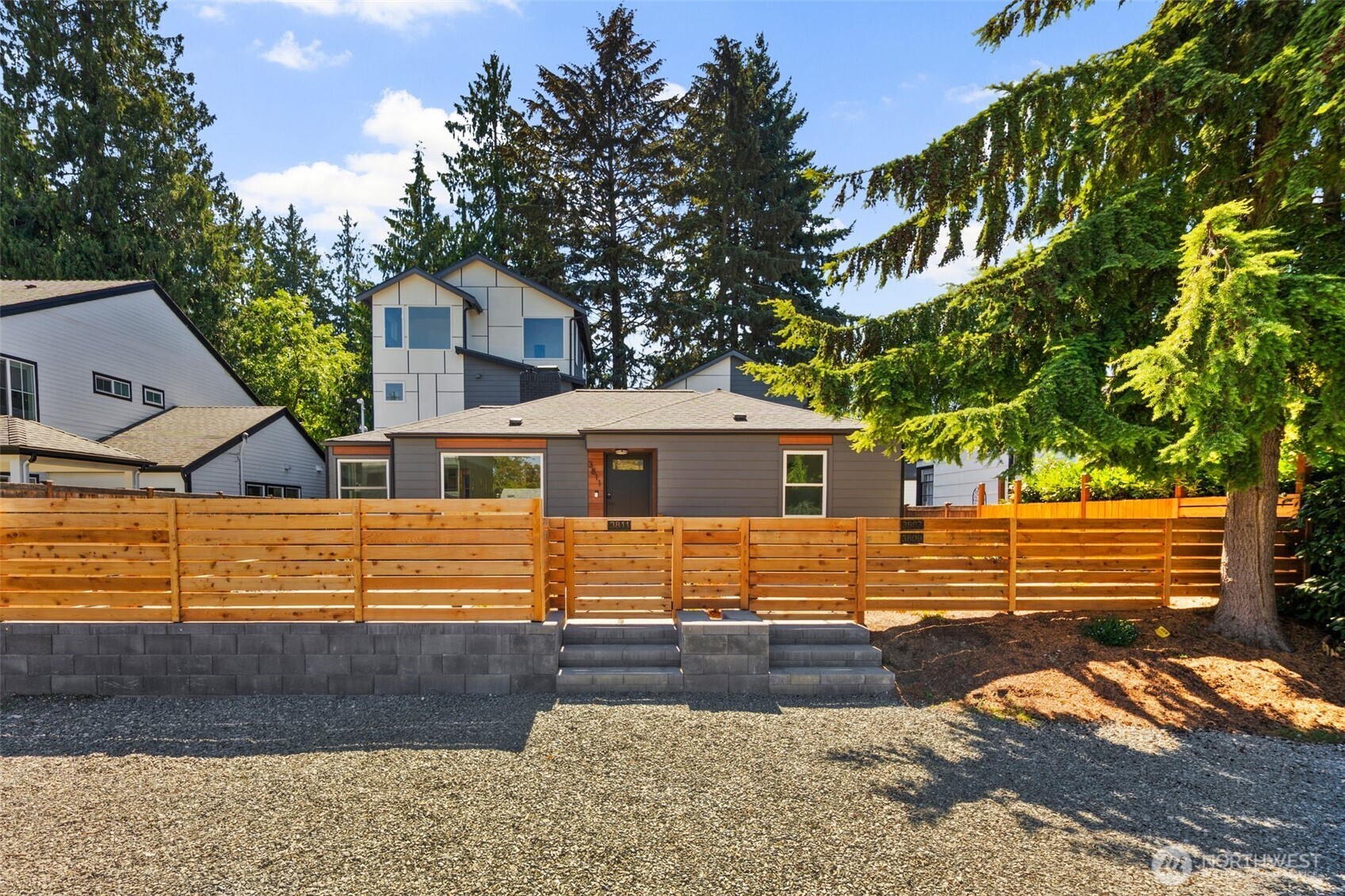 3811 Northeast 89th Street Seattle, WA 98115 - Photo 2 of 32 a front view of a house with a yard