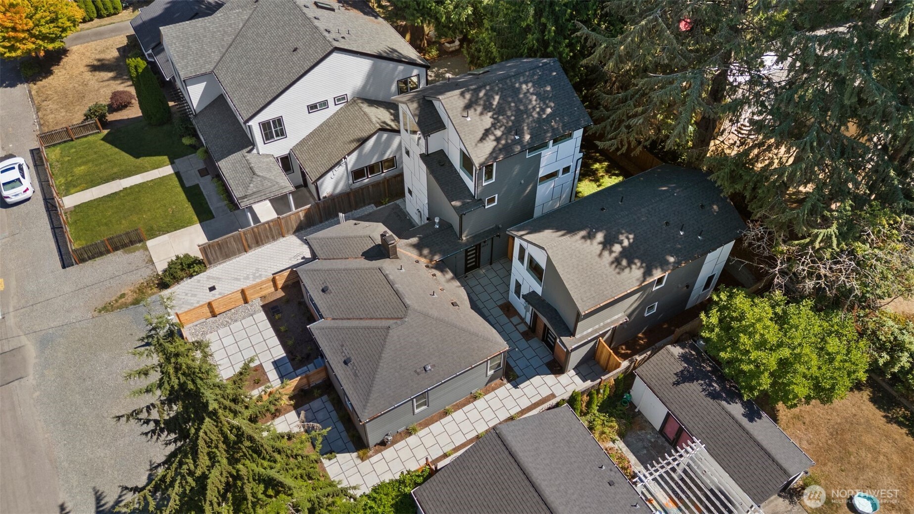 3811 Northeast 89th Street Seattle, WA 98115 - Photo 32 of 32 an aerial view of a house with a yard and parking space