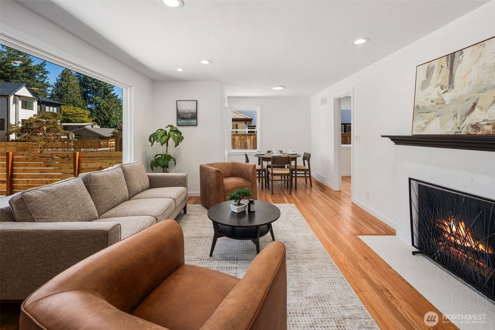 3811 Northeast 89th Street Seattle, WA 98115 - Photo 8 of 32 a living room with furniture and a fireplace