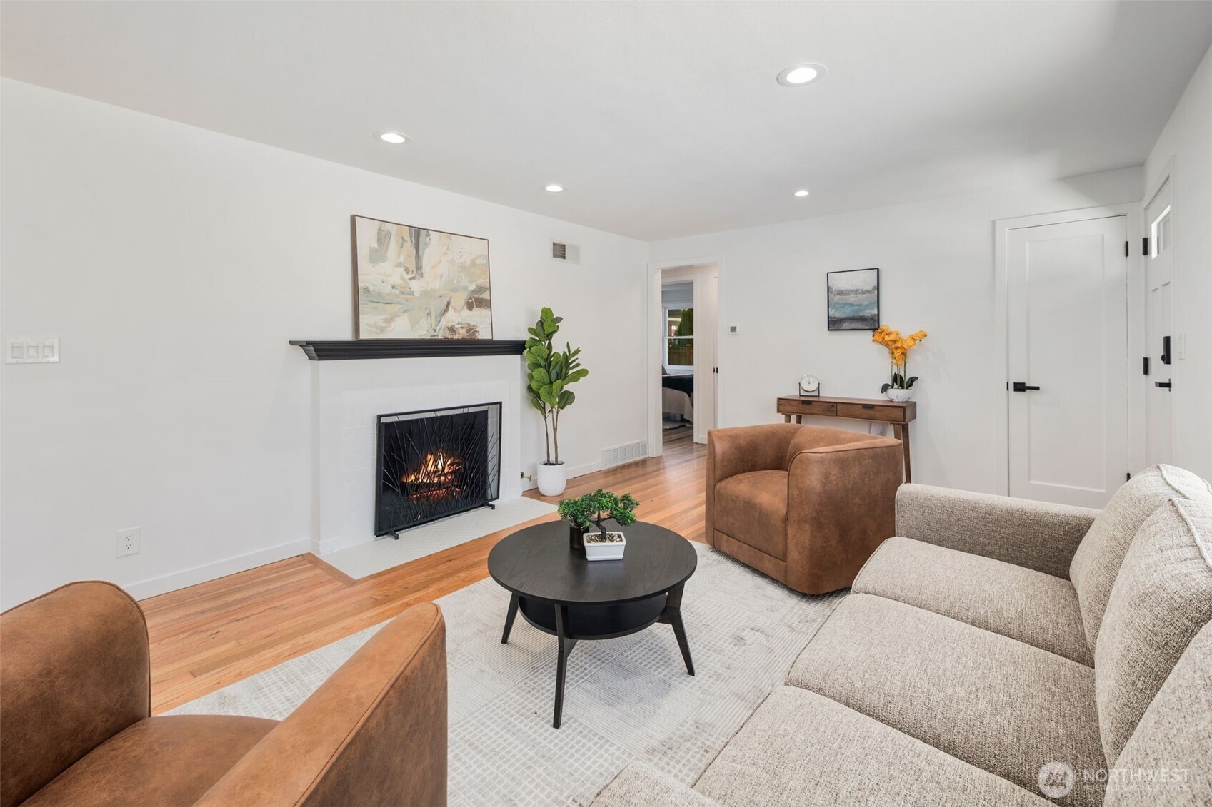 3811 Northeast 89th Street Seattle, WA 98115 - Photo 10 of 32 a living room with furniture and a fireplace