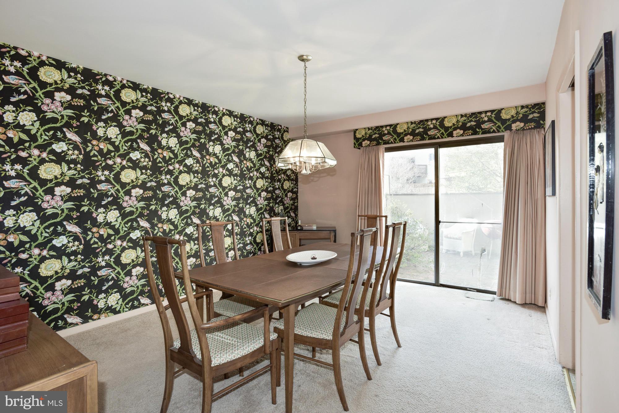 4452 Roland Springs Drive Baltimore, MD 21210 - Photo 13 of 29 a dining room with furniture and window