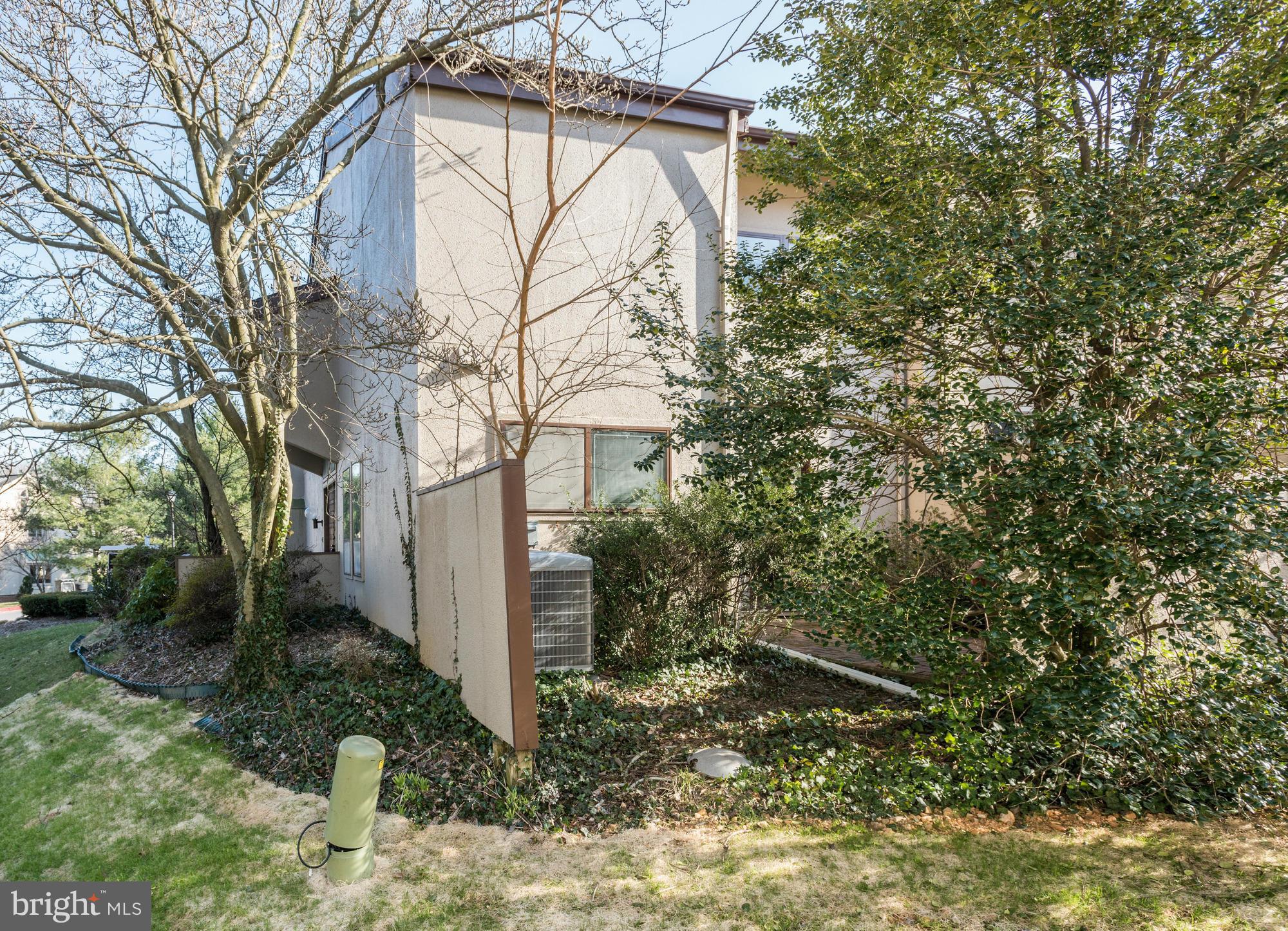 4452 Roland Springs Drive Baltimore, MD 21210 - Photo 28 of 29 a backyard of a house with lots of green space