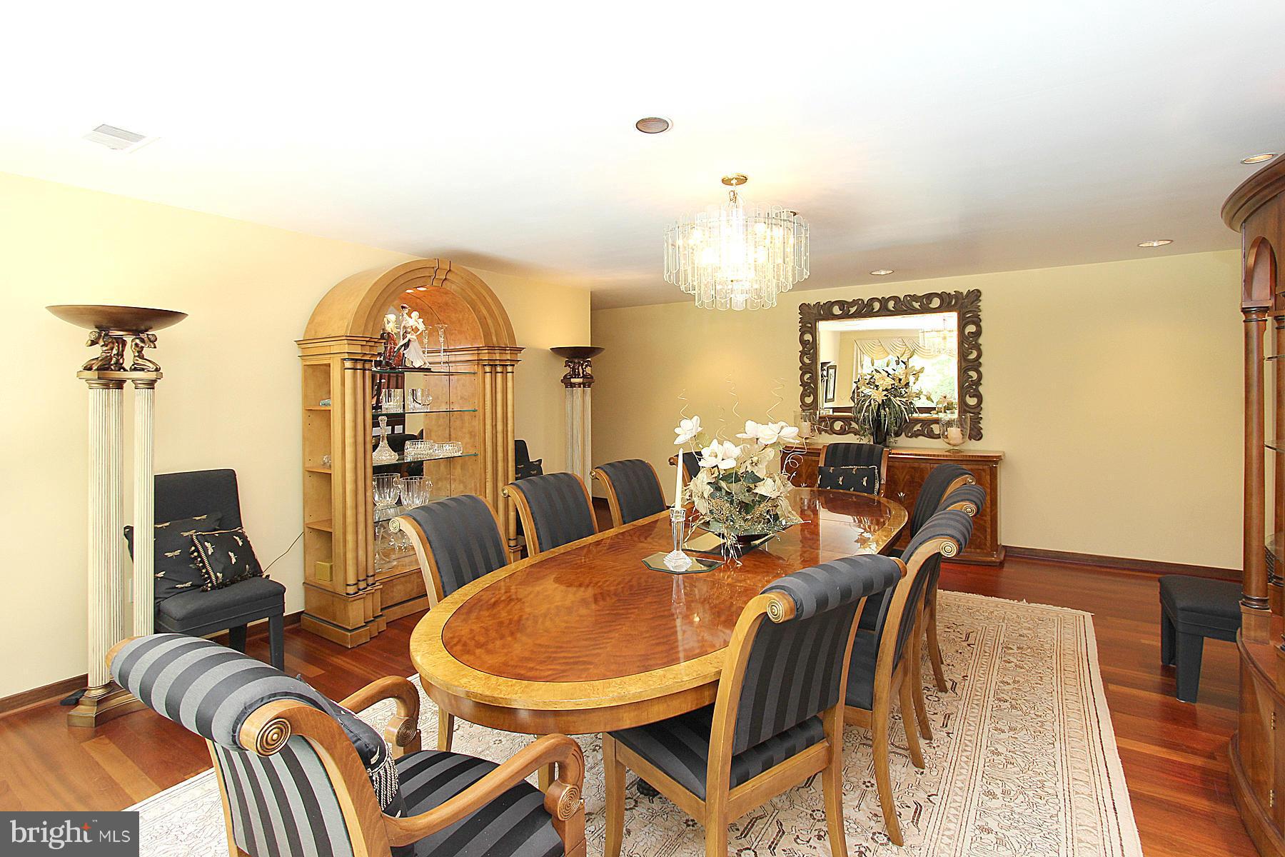 8823 Brook Road McLean, VA 22102 - Photo 11 of 30 a view of a dining room with furniture