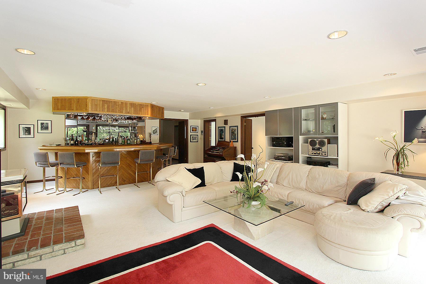8823 Brook Road McLean, VA 22102 - Photo 15 of 30 a living room with furniture and a large window