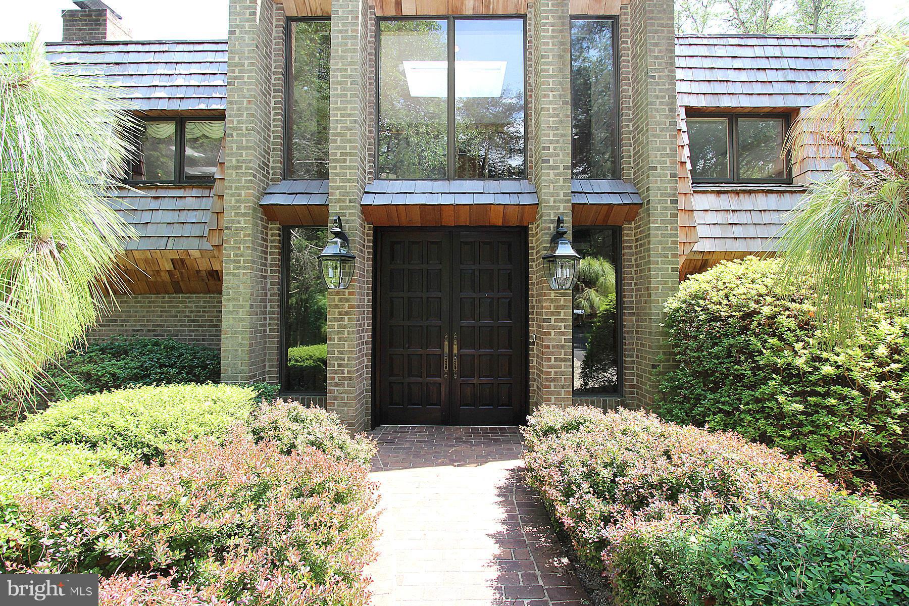 8823 Brook Road McLean, VA 22102 - Photo 2 of 30 a front view of a house