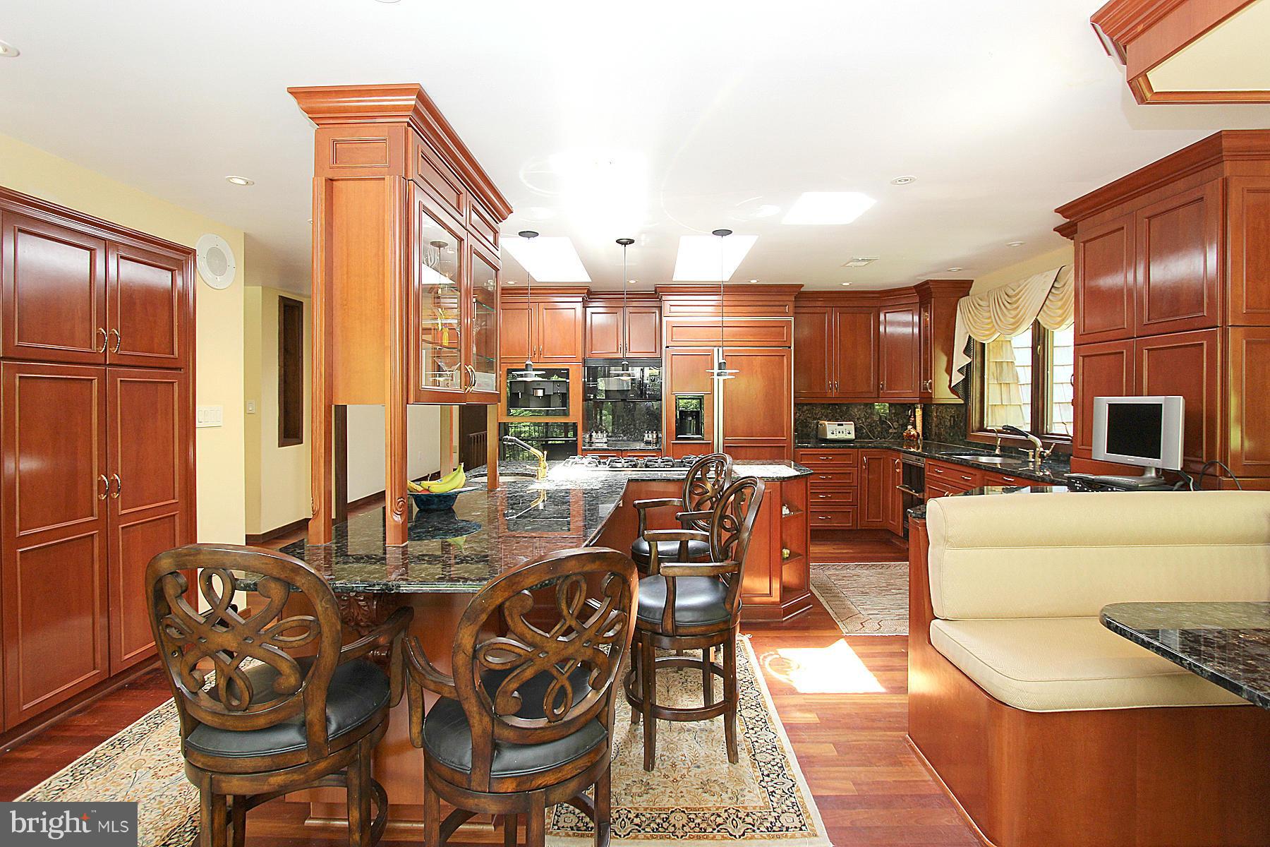 8823 Brook Road McLean, VA 22102 - Photo 7 of 30 a view of a dining room with furniture