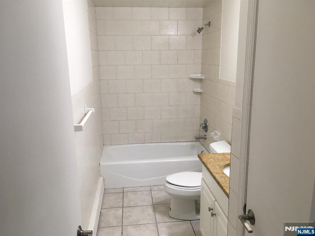 547 High Mountain Road, Unit 3 North Haledon, NJ 07508 - Photo 7 of 7 a bathroom with a toilet and a shower