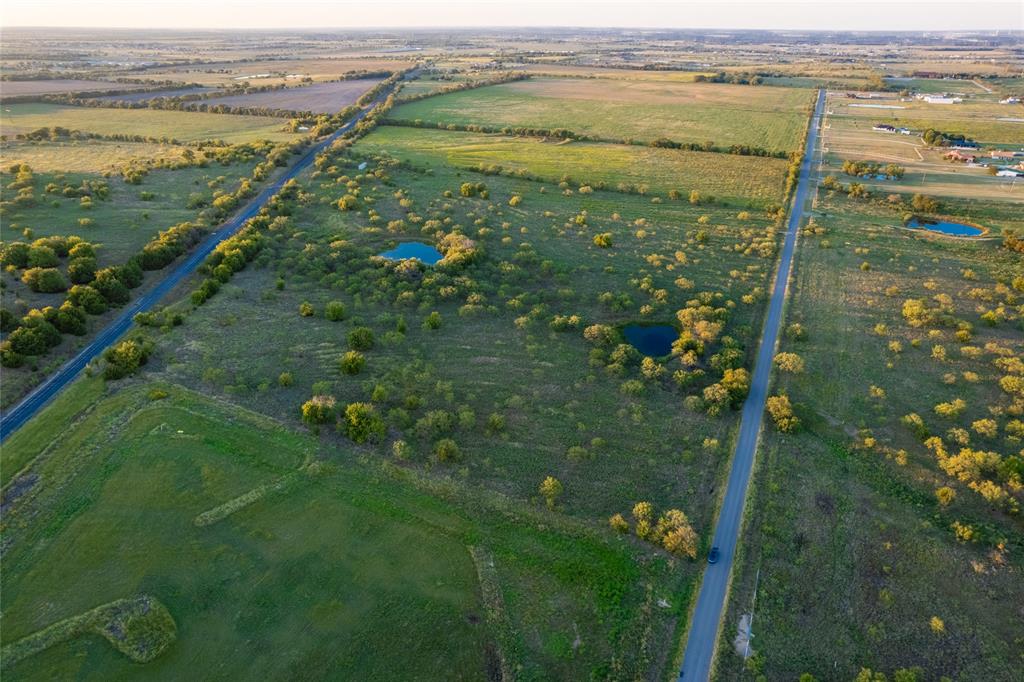 0 Barthold Road Denton, TX 76207 - Photo 5 of 9 a view of a lake with a mountain