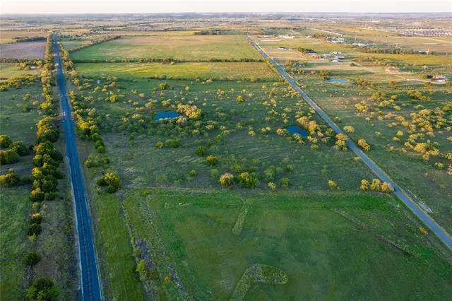 a view of an ocean and a yard