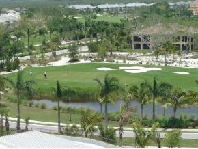 1065 Borghese Lane, Unit 704 Naples, FL 34114 - Photo 2 of 5 a view of a lake view