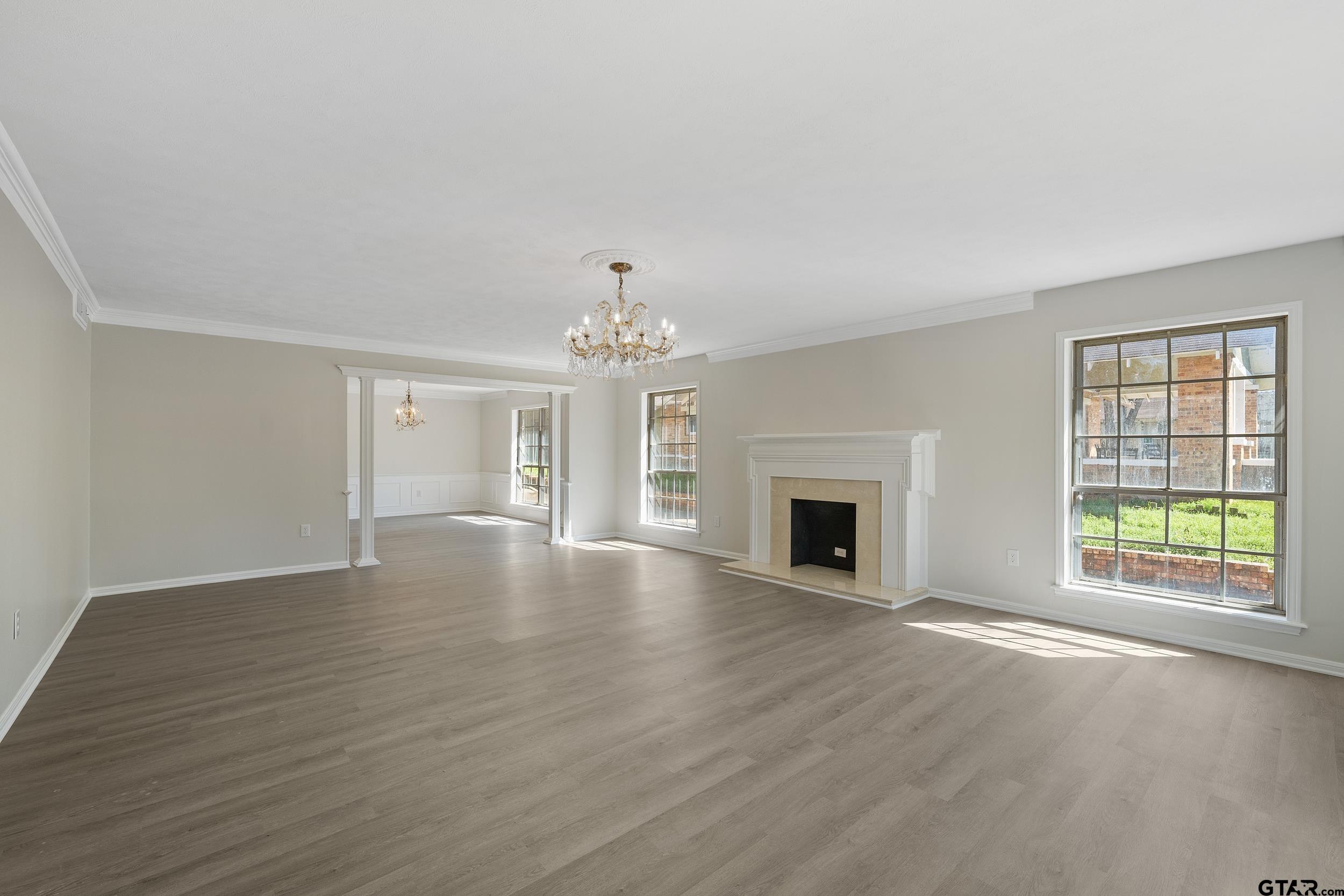 238 North Main Street Rusk, TX 75785 - Photo 12 of 42 a view of an empty room with window and fire place
