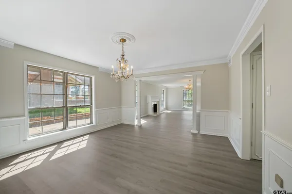 a view of livingroom with window hardwood floor and ceiling fan