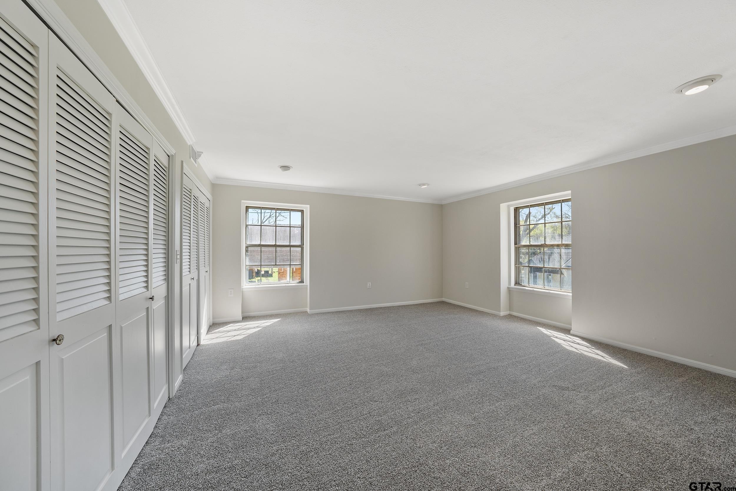 238 North Main Street Rusk, TX 75785 - Photo 7 of 42 a view of an empty room with a window