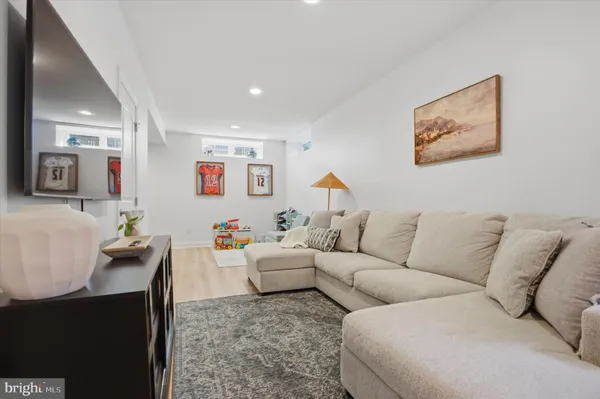a living room with furniture and a couch