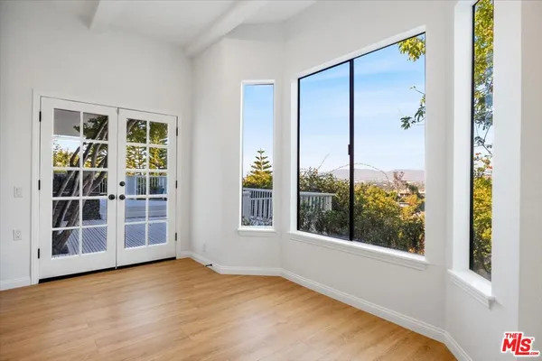 an empty room with windows