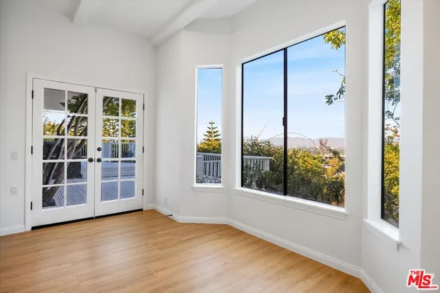 an empty room with windows