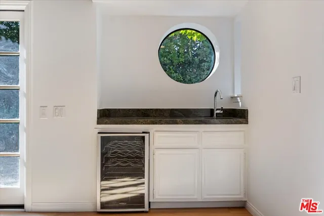 a view of a yard with an outdoor seating