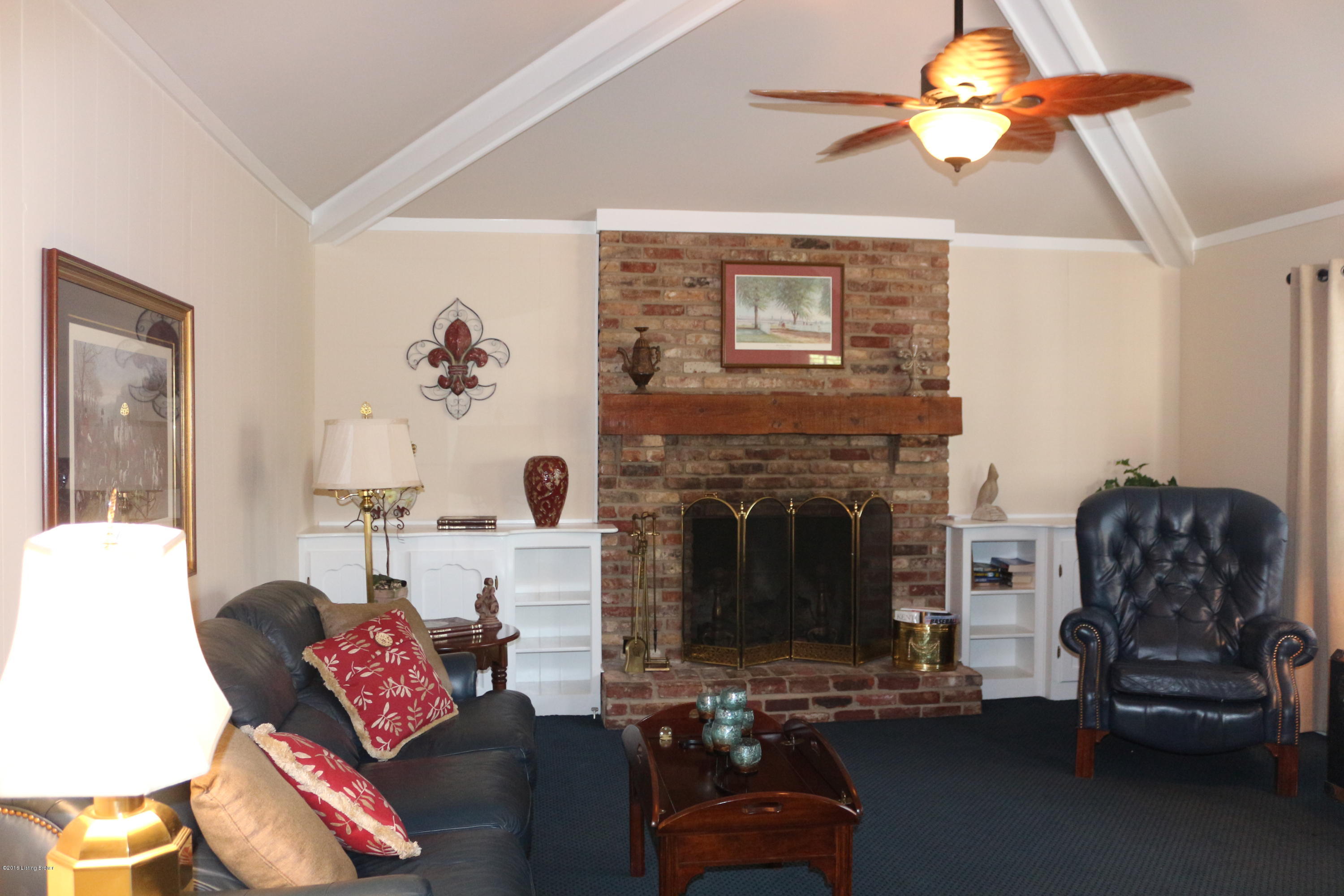 7401 Tallwood Road Prospect, KY 40059 - Photo 16 of 39 family room with fireplace and hip vaulted ceilings