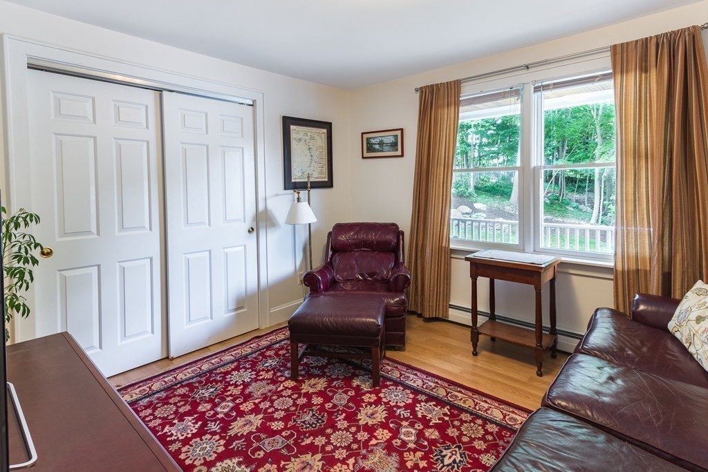 4 Echo Avenue Gloucester, MA 01930 - Photo 11 of 26 a living room with furniture and a rug