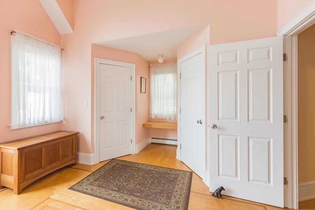 4 Echo Avenue Gloucester, MA 01930 - Photo 16 of 26 a bedroom with a bed and a window in it