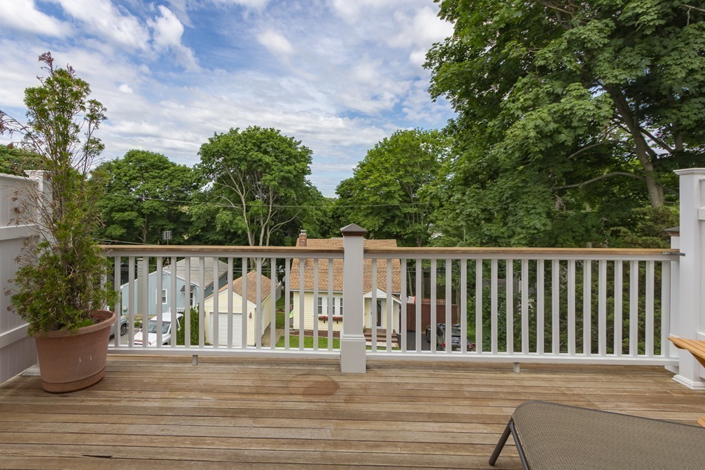 4 Echo Avenue Gloucester, MA 01930 - Photo 17 of 26 a balcony with wooden floor yard and outdoor seating