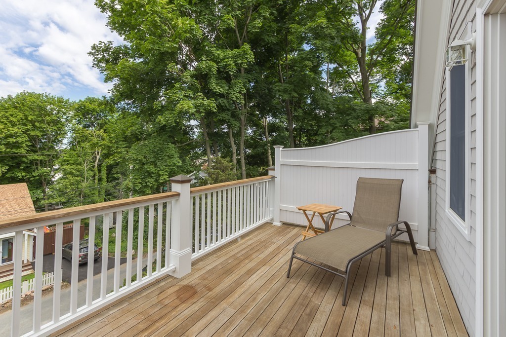 4 Echo Avenue Gloucester, MA 01930 - Photo 18 of 26 a view of a balcony with wooden floor and outdoor seating