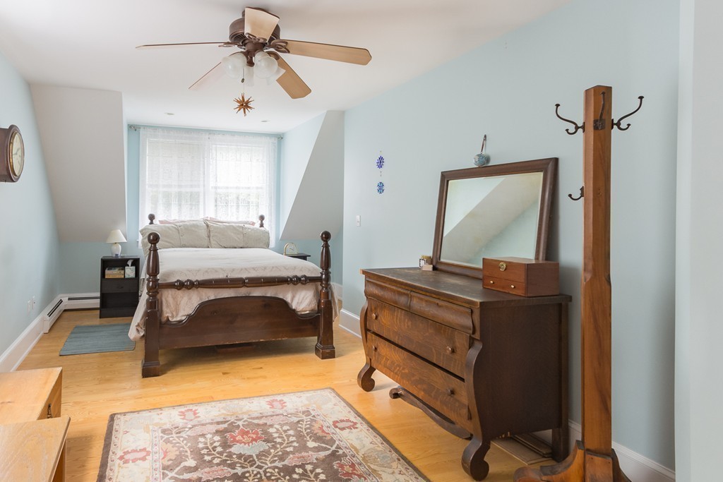 4 Echo Avenue Gloucester, MA 01930 - Photo 20 of 26 a bedroom with furniture and a mirror