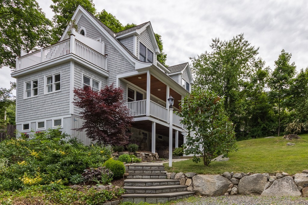 4 Echo Avenue Gloucester, MA 01930 - Photo 2 of 26 a front view of a house with a yard